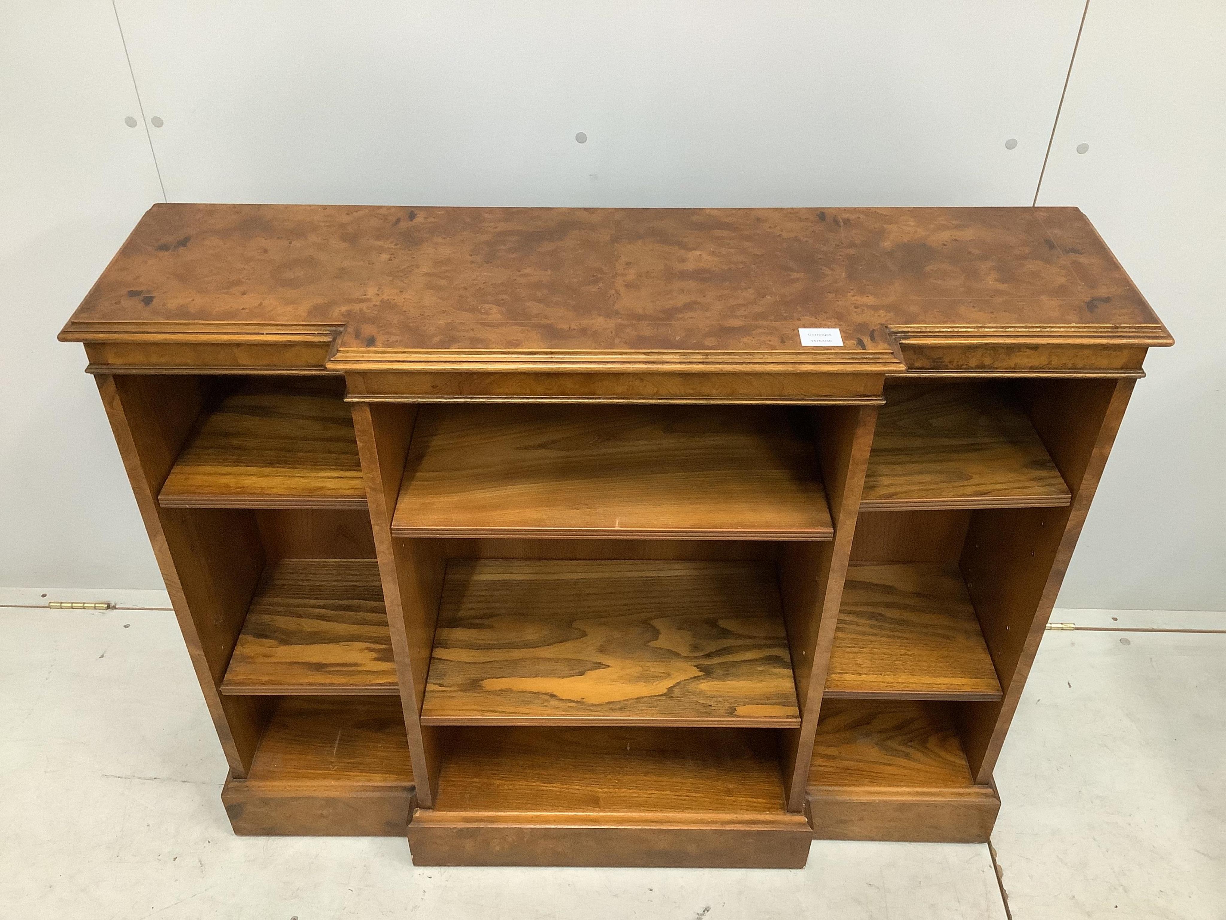 A Regency style banded burr elm dwarf breakfront bookcase, width 112cm, depth 32cm, height 91cm. Condition - good